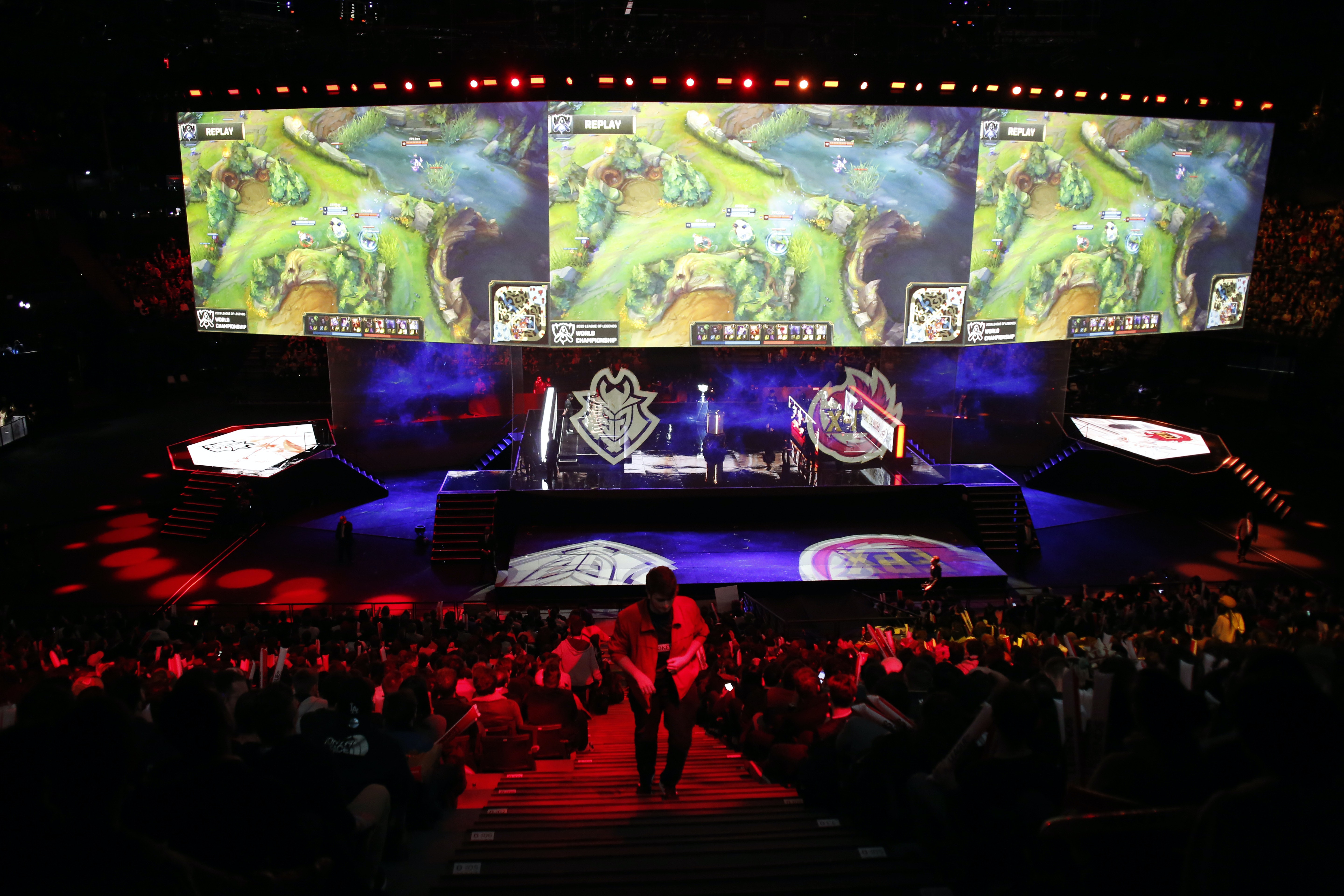 An arena full of people watching an international videogame tournament